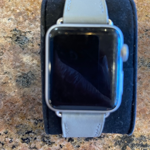 Apple Watch Series 3 38mm with Grey Leather Band (GPS). WR 50M